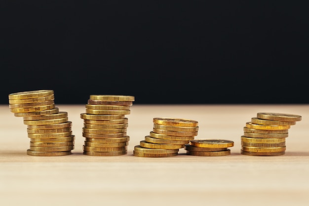 piles of coins on working table