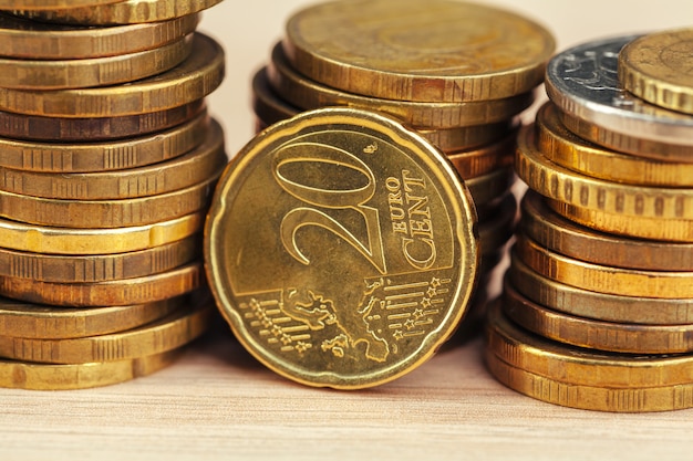 piles of coins on working table