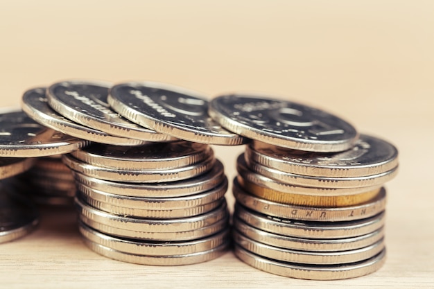 Piles of coins on working table