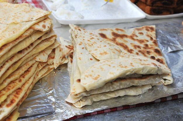 piles of Lebanese pitas in the kitchen