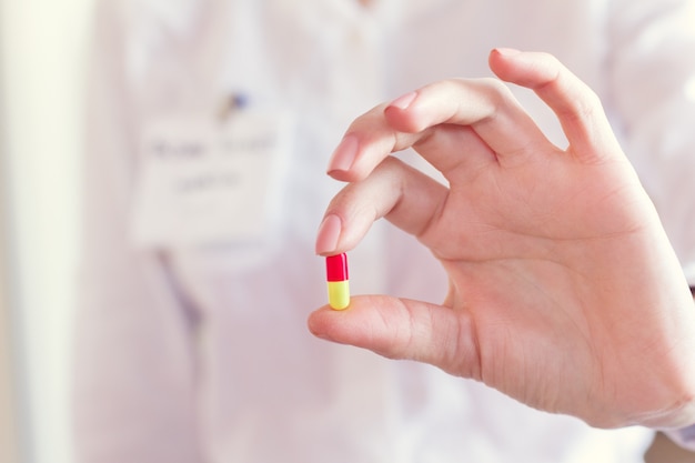 Pill capsule in a doctor's hand