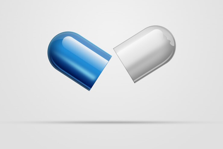 Photo a pill in the form ofcapsule of blue color,a  