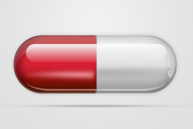 A pill in  formcapsules of red color,a light 