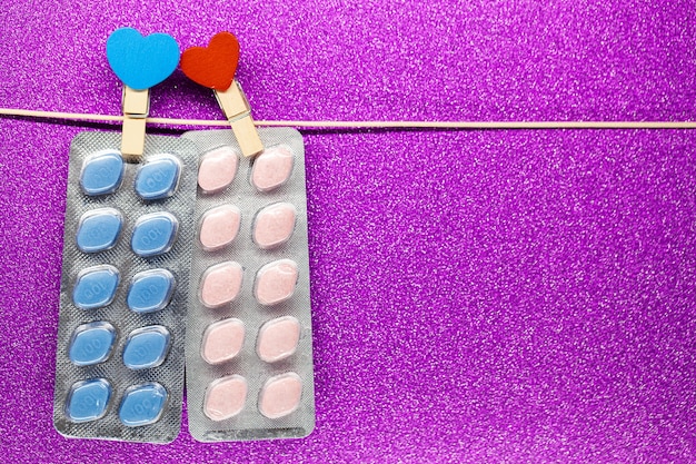 Pill for men's health and Valentine day background.