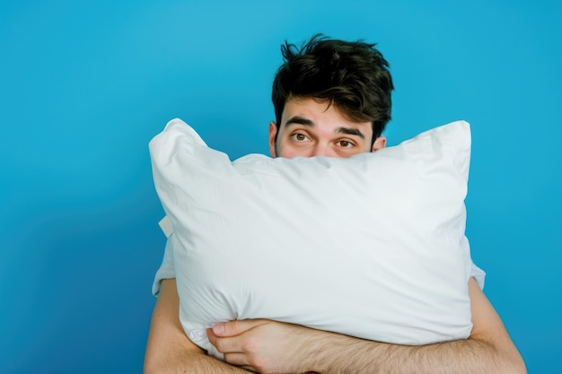 Pillow barrier man39s expressive eyes over white against blue