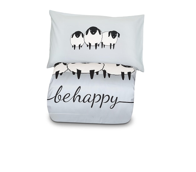 A pillow with sheep on it that says be happy.