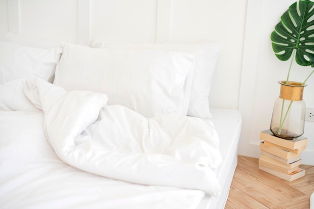 Photo pillows on empty bed at home