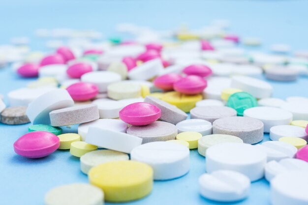 Pills on a blue background