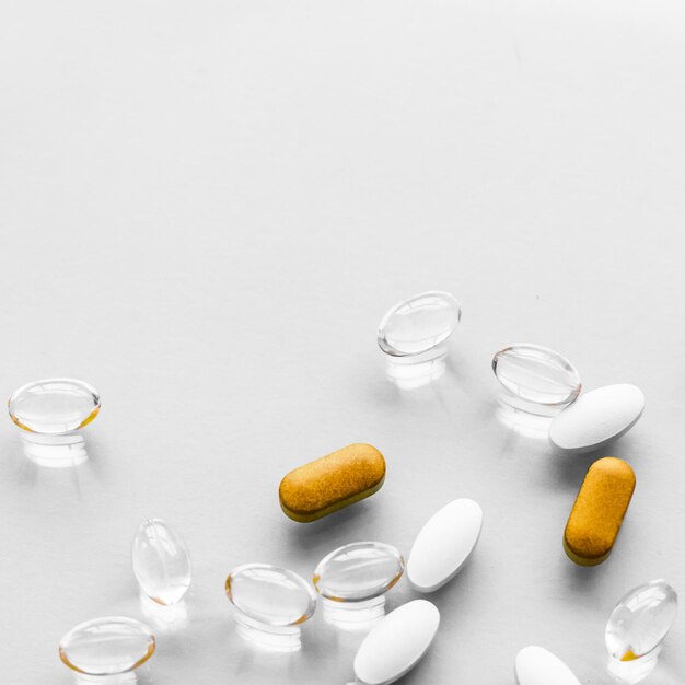 Foto pillole e capsule per la nutrizione dietetica integratori di bellezza antietà farmaci probiotici pillola vitamine come medicina e cosmetici sanitari farmacia sfondo del marchio