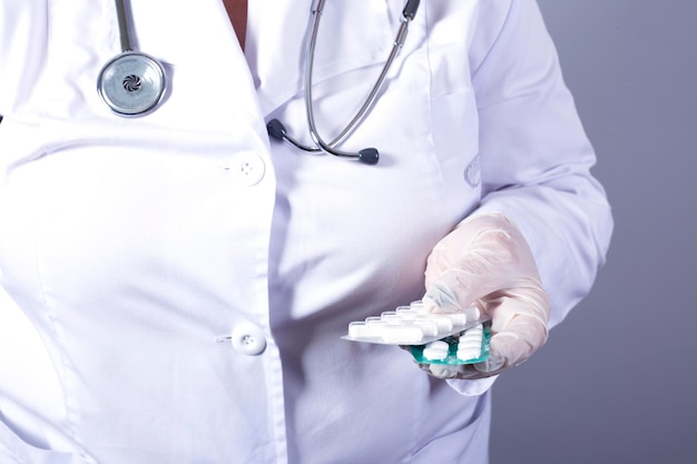 pills in doctor hand close up