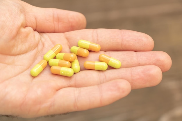 Pills in a patient's hand medicine concept