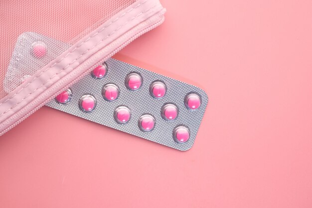 Pills on pink