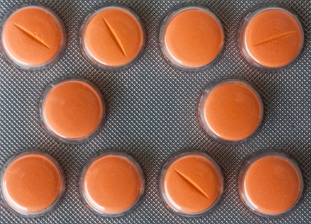 Pills on white background. Macro shot of therapy tablets 