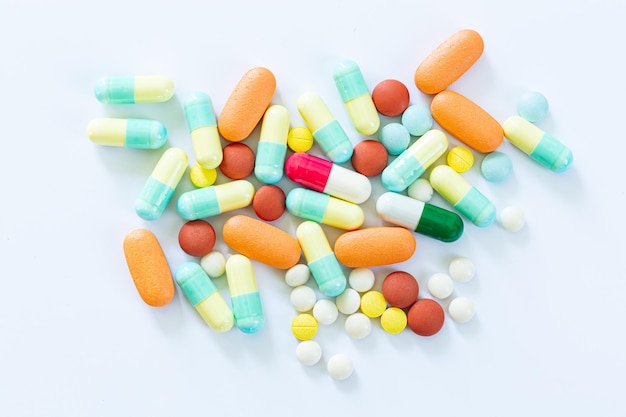 Pills on a white backgroundStack of different pills isolated on white background