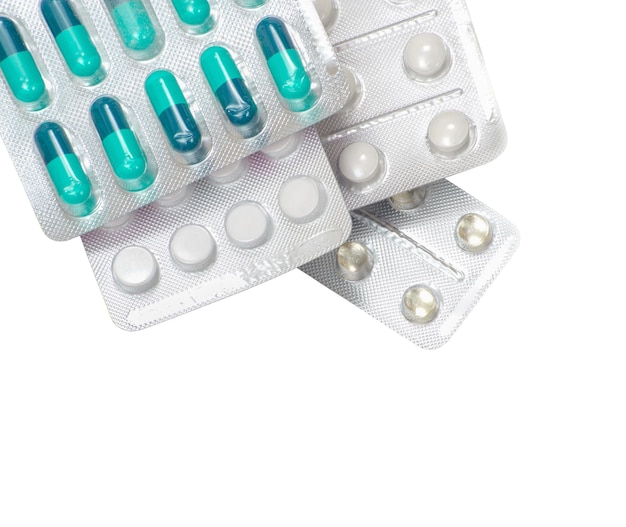 Pills with medicines on a white background