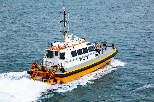 Pilot offshore ship at sea in motion