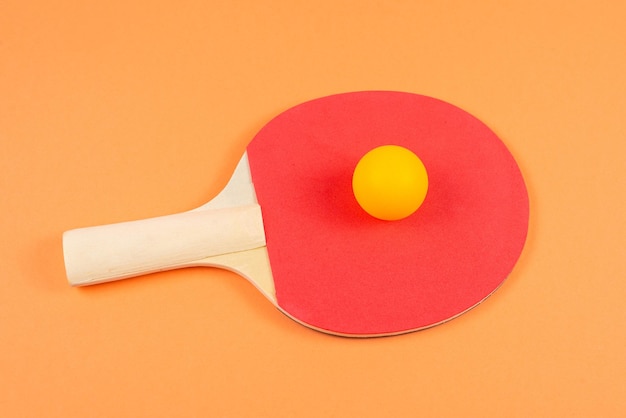 Pin pong on an orange background