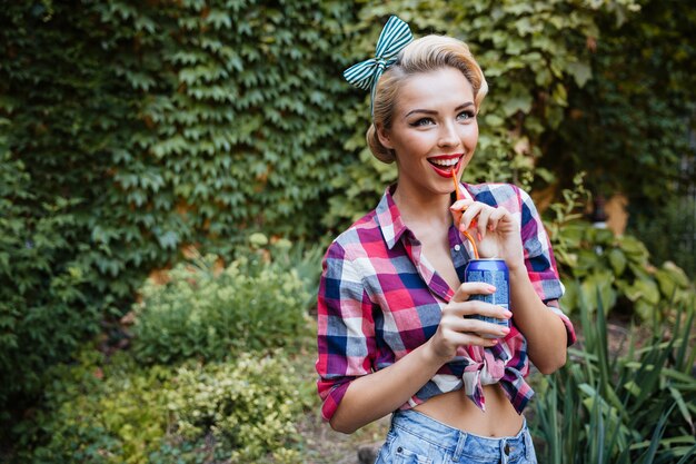 Pin-up girl posing outdoors