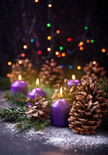 Pine cones and candle