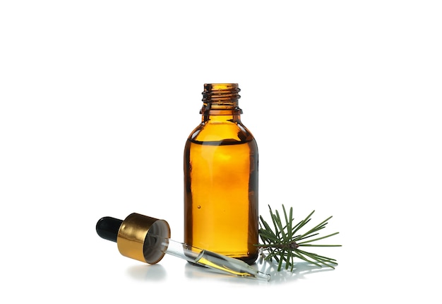 Pine essential oil isolated on white