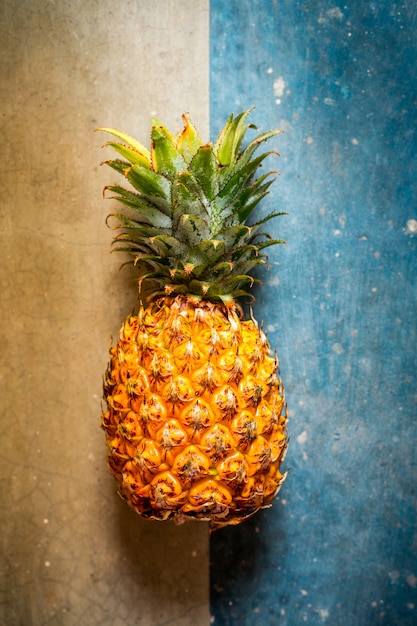 Pineapple on a concrete background