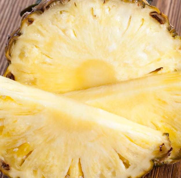 Pineapple cut into pieces during cooking