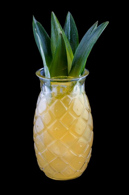 Pineapple lemonade on dark background