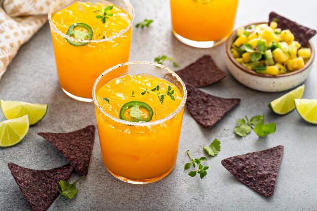 Pineapple and mango margarita with chips and guacamole