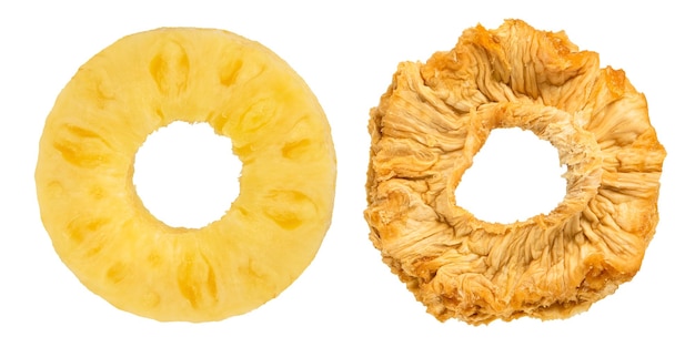 Pineapple rings on a white isolated background Concept or process of fruit drying Rings of ripe and dried pineapple as a method of processing and harvesting dried fruits