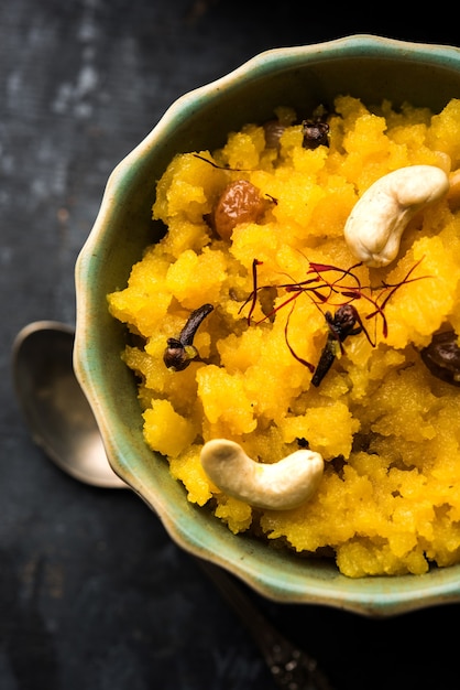 Pineapple sheera or Halwa also known as Ananas keshri shira. Popular South Indian Dessert recipe. selective focus