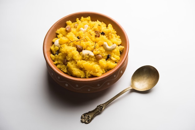 Pineapple sheera or Halwa also known as Ananas keshri shira. Popular South Indian Dessert recipe. selective focus