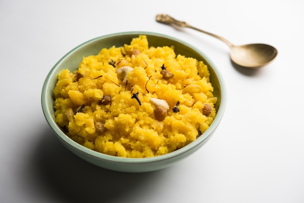 Pineapple sheera or Halwa also known as Ananas keshri shira. Popular South Indian Dessert recipe. selective focus