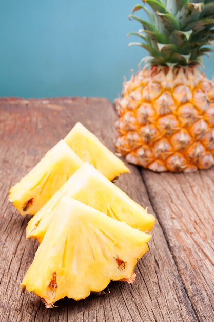 Pineapple slice on rustic wooden table