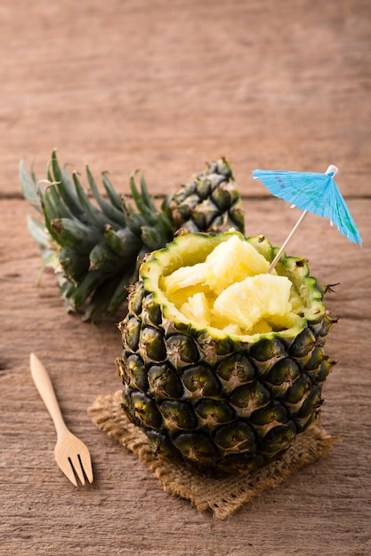 pineapple slice on wooden background