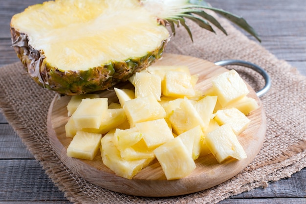 Pineapple slices on a cutting board