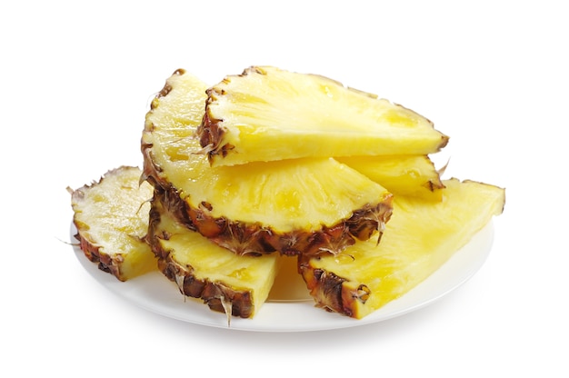 Pineapple slices on a white plate