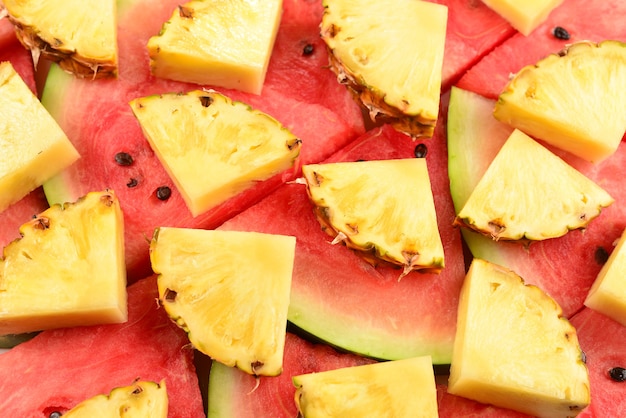 Pineapple and watermelon slices background.