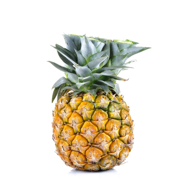 Pineapple on white wall