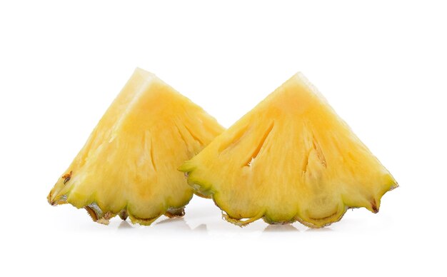 Pineapple with slices isolated on white background