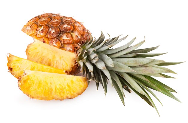 Pineapple with slices isolated on white