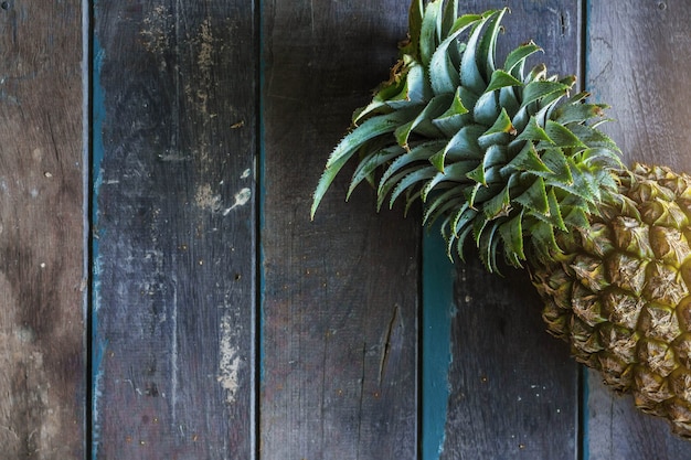 Pineapple on the  wooden.