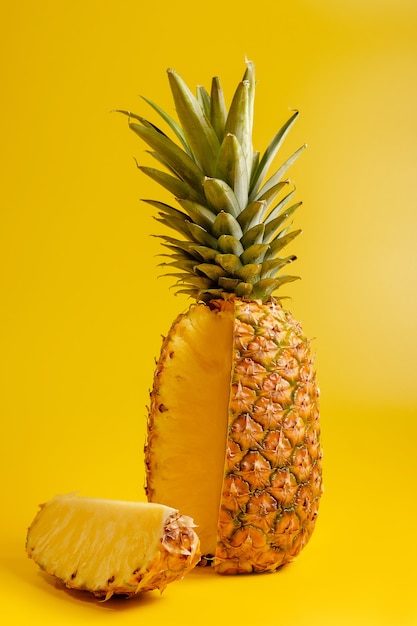 Pineapple on yellow background