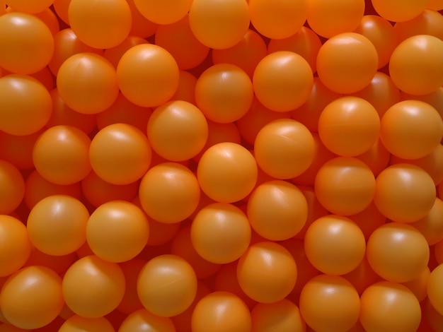 Ping pong balls background orange