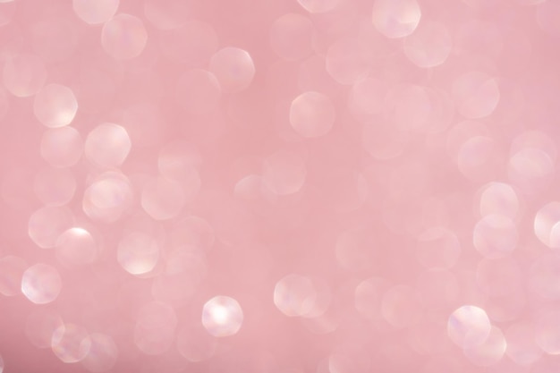 Pink abstract glitter background with shiny bokeh