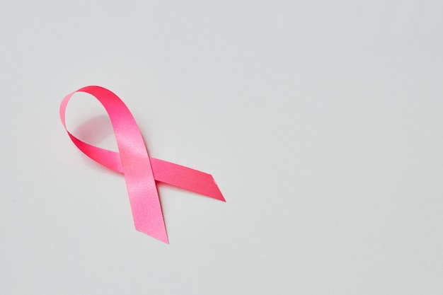 Pink awareness ribbon with trail