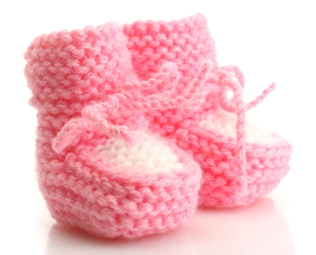 Pink baby boots isolated on white