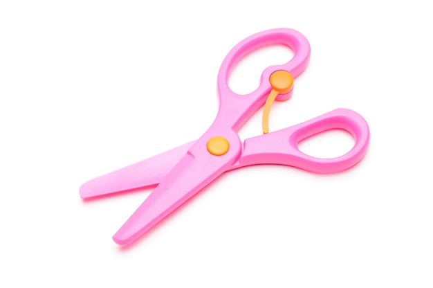 Pink baby scissors isolated