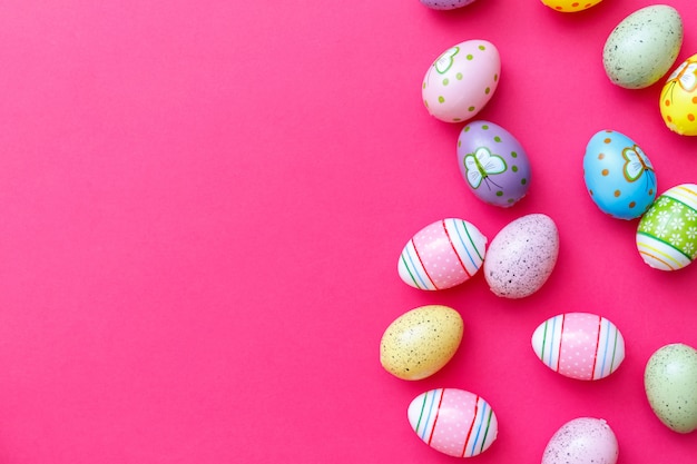 Pink background with colorful easter eggs