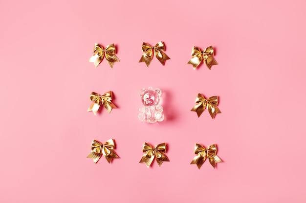 Pink background with golden bows