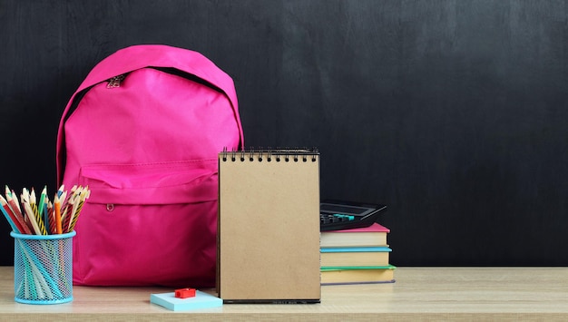 Pink backpack and school supplies